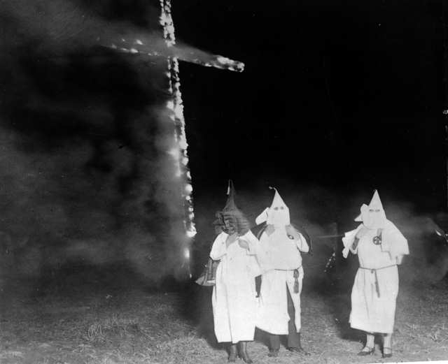 ku_klux_klan_members_and_a_burning_cross_denver_colorado_1921